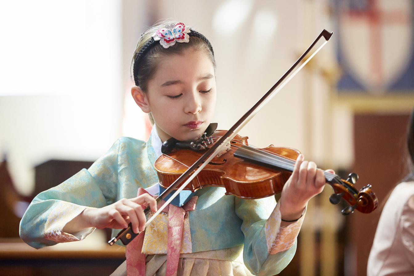 Student performing at CSM violin recital