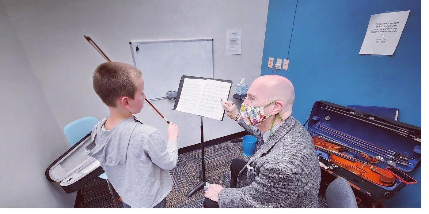 Violin teacher and student during lesson at CSM